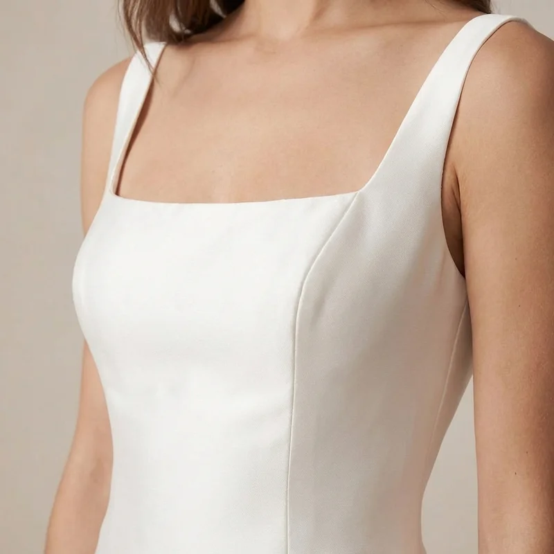 Modern Structured Satin Wedding Dress with Architectural Neckline - 3